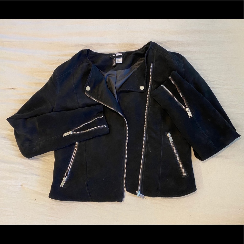 Black suede moto jacket with silver hardware